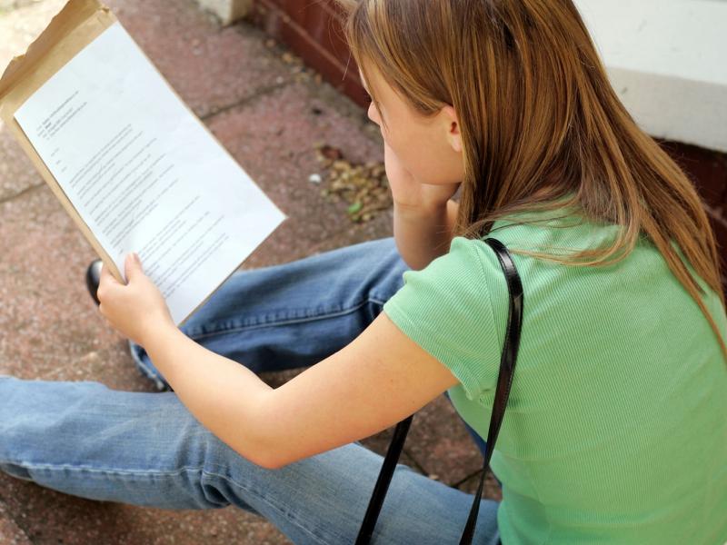 Exam видео. Exam student. She is reading. Girl looks at her Exam Results. Exam Results.